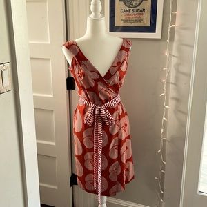 Red and white patterned wrap dress